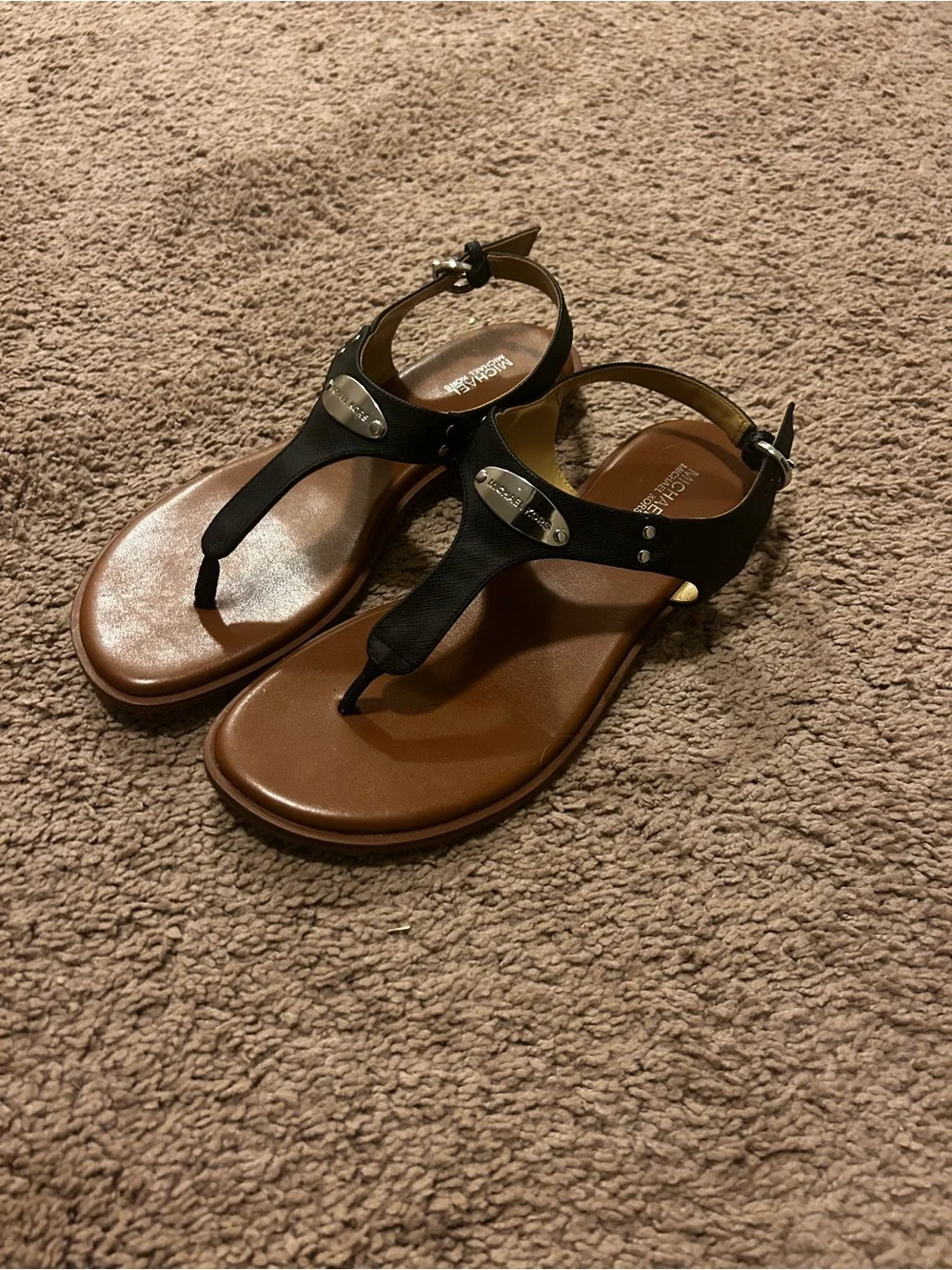 Michael Kors Women’s Black T-StrapFlat Sandals Silver Logo Buckle (Size 9)